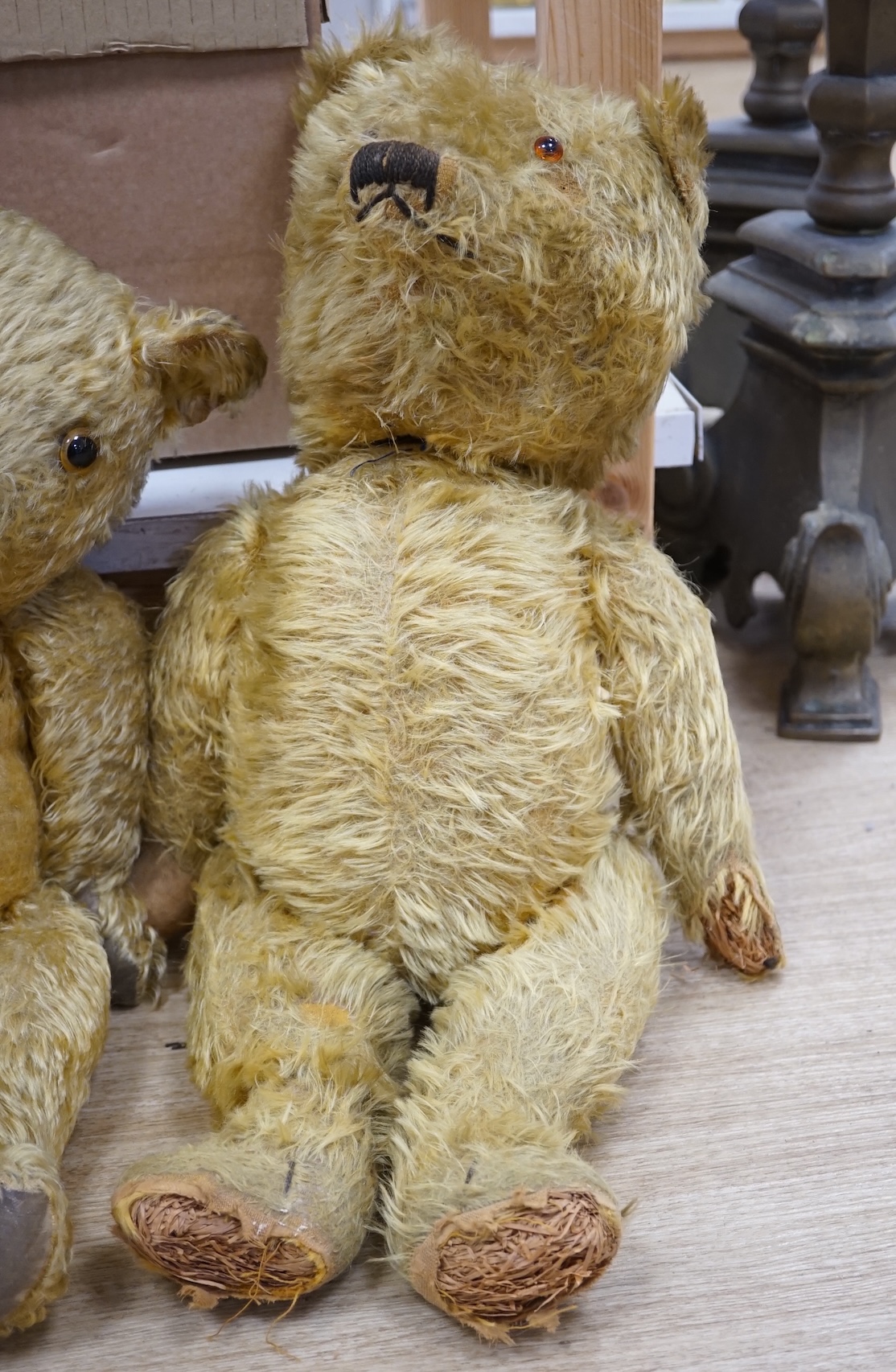 A Chiltern bear c.1950's, 55cm, tear to one velvet pad otherwise in good condition, and a 1930's bear, 50cm, repaired paw pads and nose